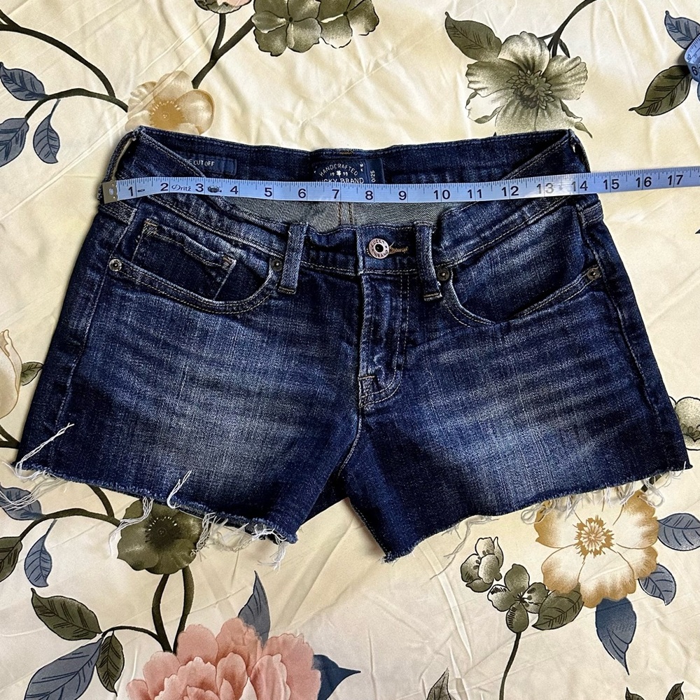 Lucky Brand size 0/25 dark denim shorts. Worn but in excellent condition.